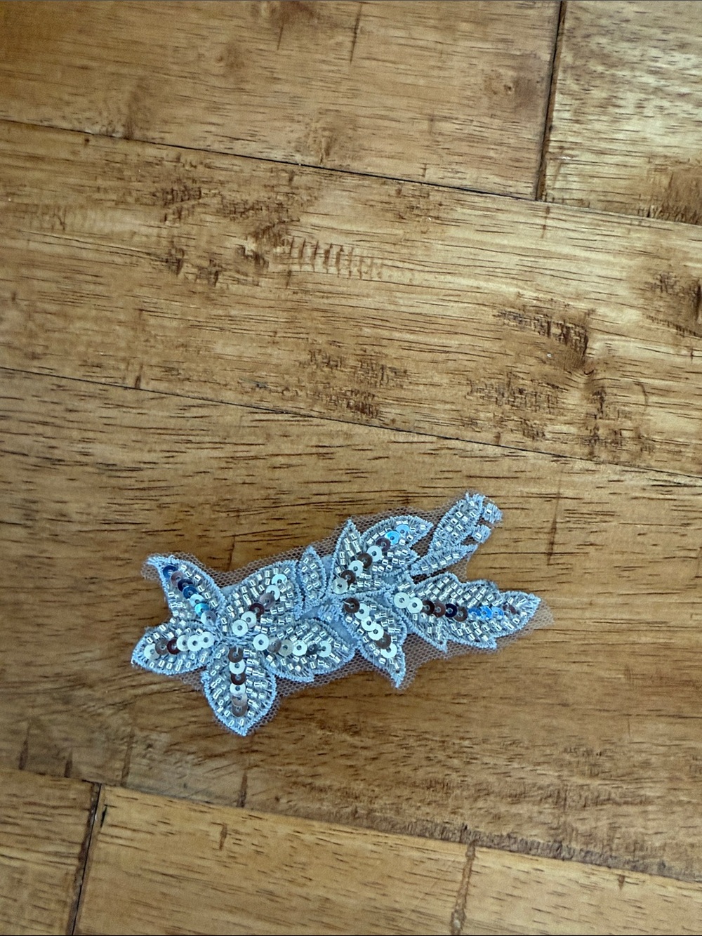 Silver sequin headpiece for dance or costume.